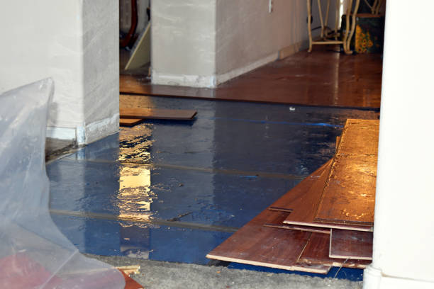 Professional Flood Damage Restoration technician working in Fort Pierce, FL